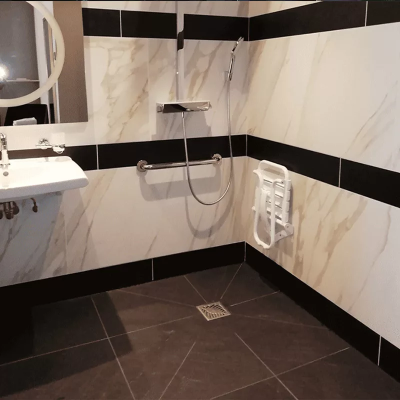 Antidérapant Stellmann appliqué dans les douches de l'Hôtel Niepce Paris